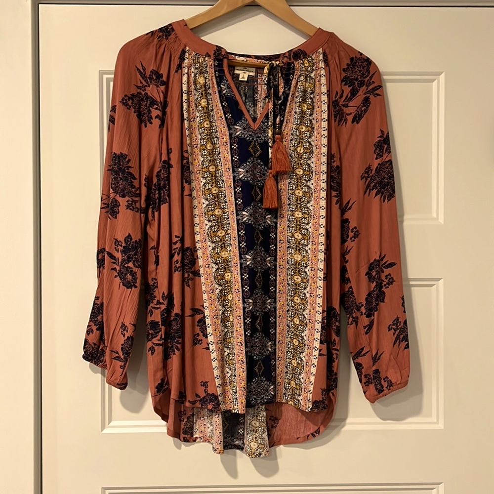 Cute blouse that has never been worn!  Size L